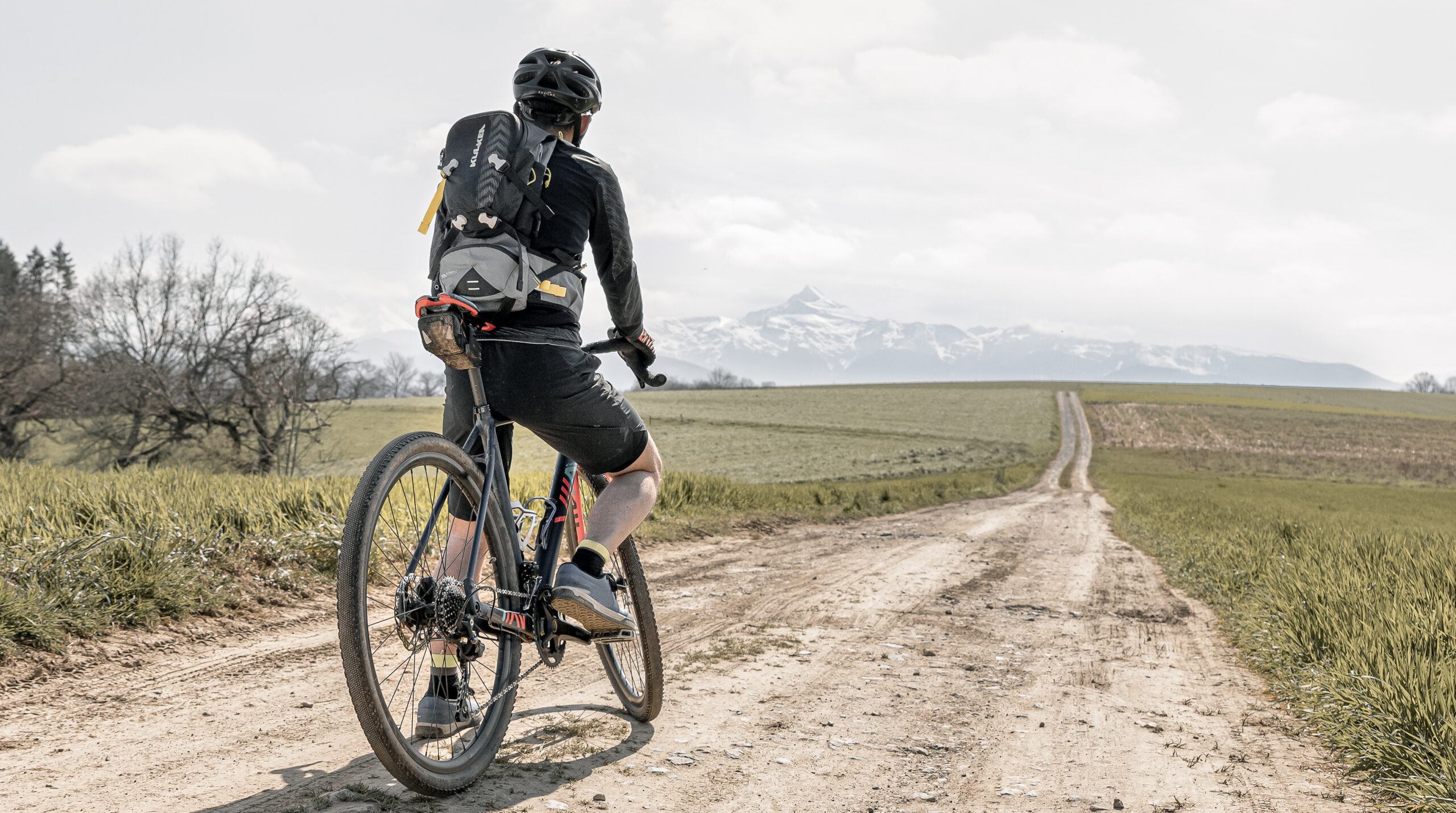Hydration reservoir storage integrated into technical backpack
