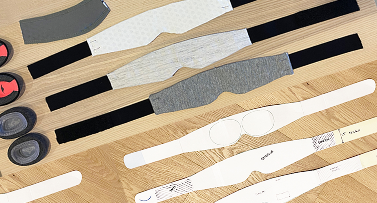 Low-fidelity and high-fidelity soft goods prototypes used during product development.